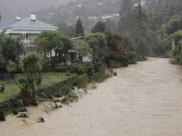 A house on the banks of Nelson's flooded Maitai River