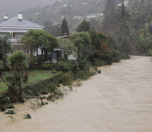 A house on the banks of Nelson's flooded Maitai River