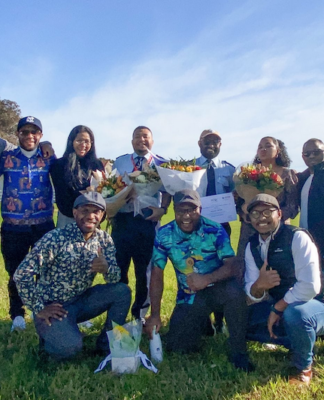 Some of the Papuan students in New Zealand with the graduating pilots from Ardmore Flying School