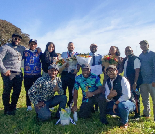 Some of the Papuan students in New Zealand with the graduating pilots from Ardmore Flying School
