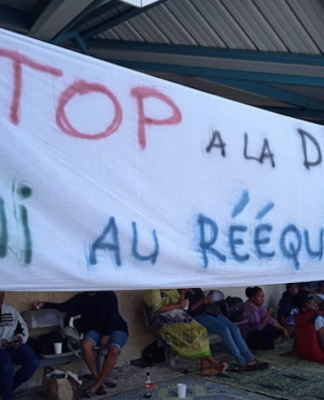 Ongoing union strikes disrupt more domestic flights in New Caledonia A "stop racial discrimination" banner at Magenta-Noumea Airport