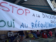 A "stop racial discrimination" banner at Magenta-Noumea Airport
