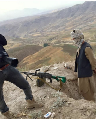 Photographer Massoud Hossain filming in Balkh province, Afghanistan