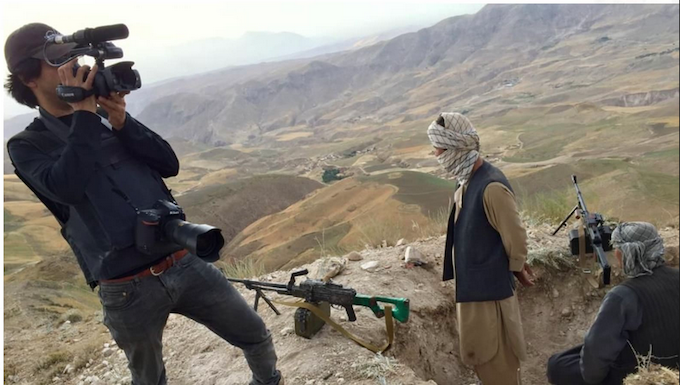 Kabul one year on – cat-and-mouse with the Taliban intelligence agents Photographer Massoud Hossain filming in Balkh province, Afghanistan