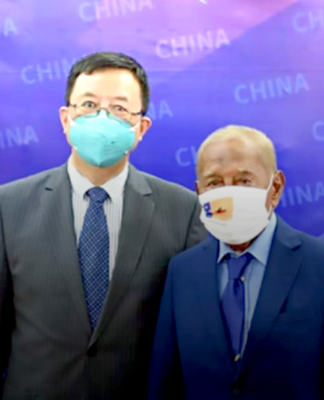 PNG’s longest serving politician Governor Chan hits ground running Ambassador Zeng Fanhua and Sir Julius Chan
