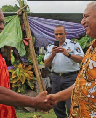 Sitiveni Rabuka (left) with Voreqe Bainimarama in 2018.