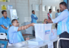 Votes being loaded into a ballot box during the 2018 Fiji general election