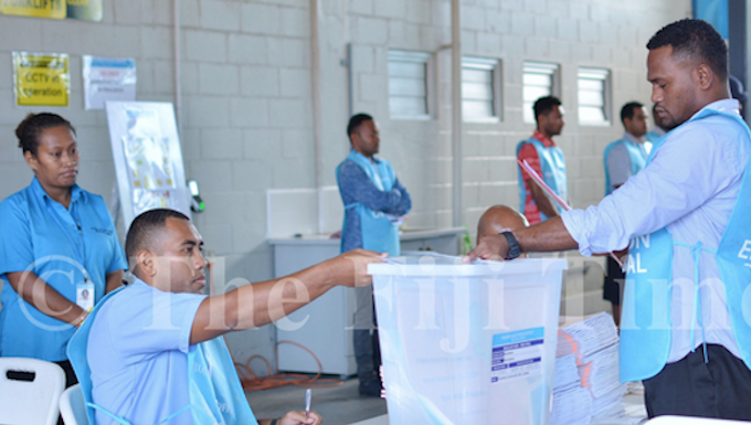 Votes being loaded into a ballot box during the 2018 Fiji general election