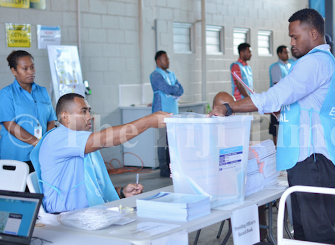 Votes being loaded into a ballot box during the 2018 Fiji general election
