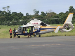 A helicopter landing at Pekoa airport in Santo with ballot boxes