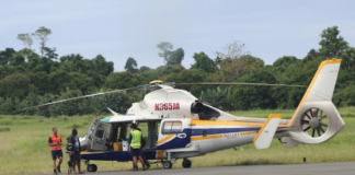 A helicopter landing at Pekoa airport in Santo with ballot boxes
