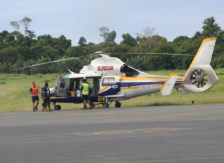 A helicopter landing at Pekoa airport in Santo with ballot boxes