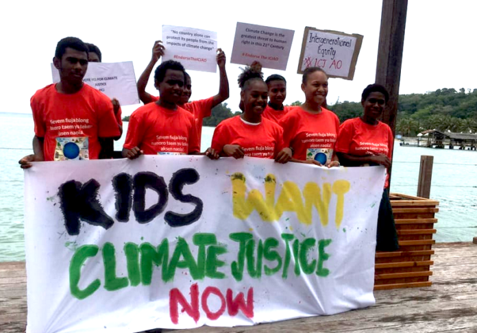 Children in Vanuatu protest for climate change action