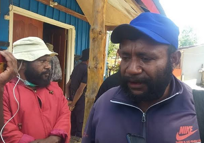 Chairman of the Papuan Customary Council Dominikus Surabut speaking to reporters