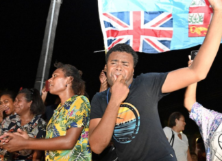 Fijians in the capital Suva celebrate the end of 16 years of authoritarian rule - eight years of military dictatorship followed by a rigid "democracy".