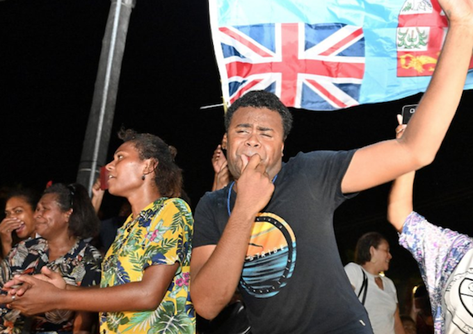 Fijians in the capital Suva celebrate the end of 16 years of authoritarian rule - eight years of military dictatorship followed by a rigid 