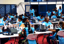 Fijian Elections Office staff busy at the National Results Centre