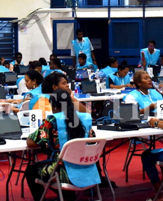 Fijian Elections Office staff busy at the National Results Centre