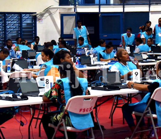 Fijian Elections Office staff busy at the National Results Centre