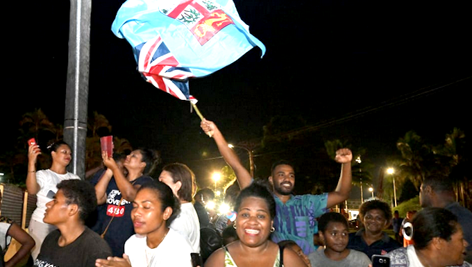 Workers and supporters of the People's Alliance Party celebrate