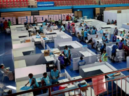 Manual counting underway at the National Counting Centre in the National Gymnasium in Suva