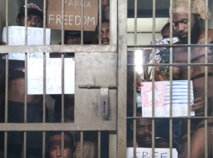 Jailed flag-raiser Melvin Yobe and his friends took a group photo