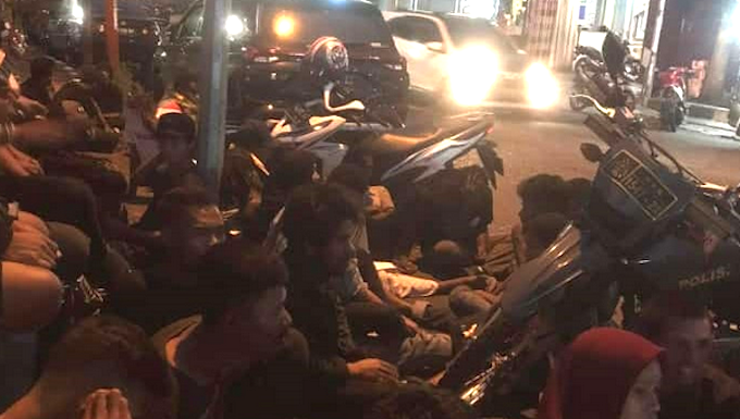 Dozens of activists of the Indonesian People's Front for West Papua protesters stage sit-in in North Maluku