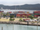 The port of Noumea in New Caledonia . . . unions had sought an across-the-board pay increase of 6 percent in the private sector to offset inflation