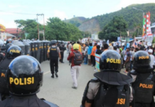 Indonesian police blockade a protest in the Papuan capital of Jayapura