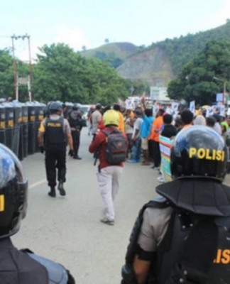 Indonesian police blockade a protest in the Papuan capital of Jayapura