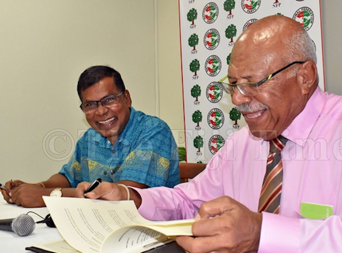 Fiji Deputy PM Professor Biman Prasad (left) and Prime Minister Sitiveni Rabuka