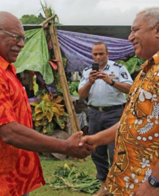 Former prime minister Sitiveni Rabuka (left) and caretaker PM Voreqe Bainimarama in January 2018