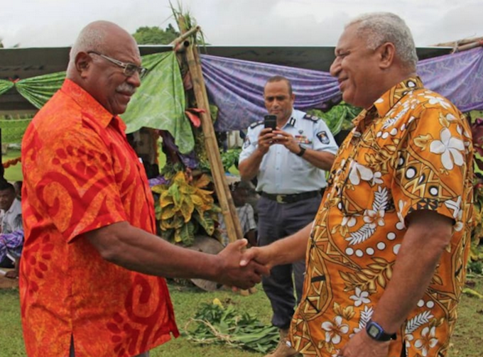 Former prime minister Sitiveni Rabuka (left) and caretaker PM Voreqe Bainimarama in January 2018