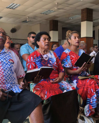 New Fiji Prime Minister leader Sitiveni Rabuka singing at church ahead of announcing the formation of a coalition government