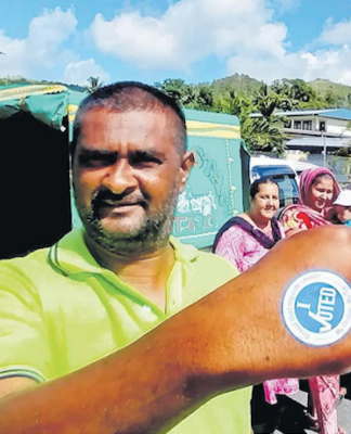 Mohammed Riyaz and his family after voting at Conua District School at Kavanagasau, Nadroga, in last month's Fiji general election