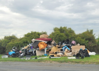 A photo taken by Turehou Māori Wardens Trust chairperson Mereana Peka last month showing piles of rubbish left by the side of the road in Ihumātao Rd, adjoining the Ōtuataua Stonefields Reserve