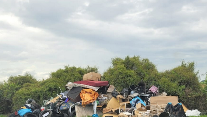 A photo taken by Turehou Māori Wardens Trust chairperson Mereana Peka last month showing piles of rubbish left by the side of the road in Ihumātao Rd, adjoining the Ōtuataua Stonefields Reserve