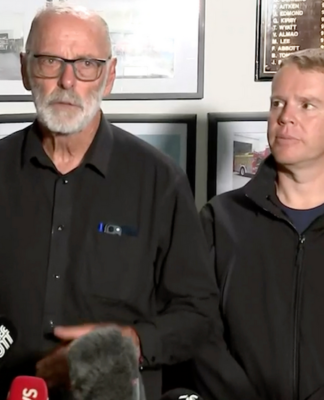 Auckland mayor Wayne Brown (left) fronting a media conference