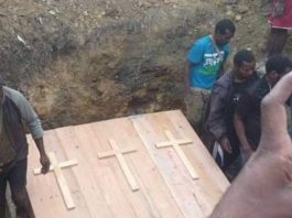 The coffins of three of the four Papuan civilian victims of the brutal killing in August 2022