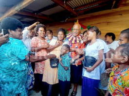 Fiji Prime Minister Sitiveni Rabuka with villagers of Wailevu