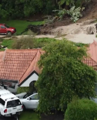 A slip at Tauranga in New Zealand's North Island split this house in half