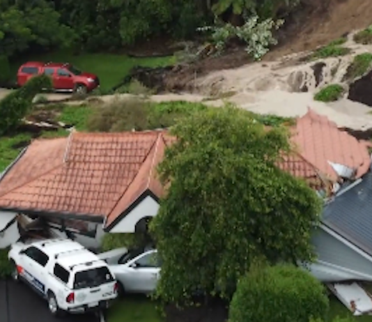 A slip at Tauranga in New Zealand's North Island split this house in half