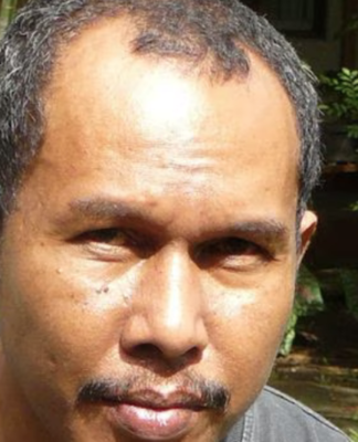 Papuan journalist and editor Victor Mambor