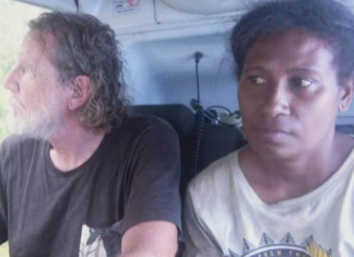 PNG Prime Minister James Marape shared this photo on Facebook of Professor Bryce Barker and one of his research colleagues after their release