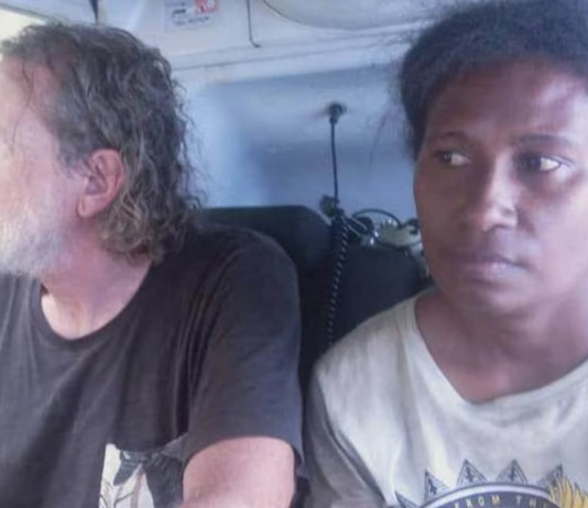 PNG Prime Minister James Marape shared this photo on Facebook of Professor Bryce Barker and one of his research colleagues after their release