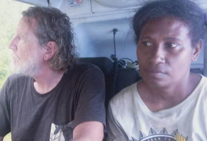 PNG Prime Minister James Marape shared this photo on Facebook of Professor Bryce Barker and one of his research colleagues after their release