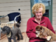 Bay View cyclone survivor Maureen Dorr holds her dog Pancho