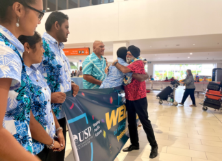 USP vice-chancellor Professor Pal Ahluwalia is greeted by USP staff and students