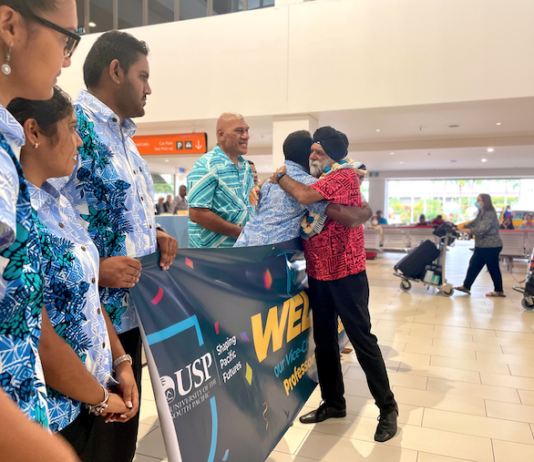 USP vice-chancellor Professor Pal Ahluwalia is greeted by USP staff and students