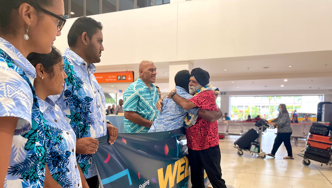 USP vice-chancellor Professor Pal Ahluwalia is greeted by USP staff and students